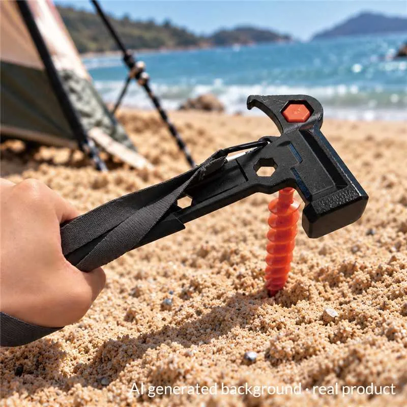 ESSE 2 in 1 Hammer Wrench with a sand peg on the beach