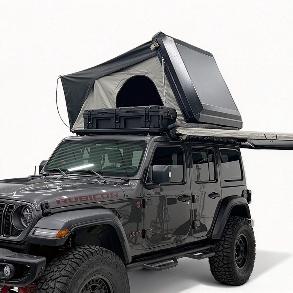 Light Side Open roof top tent opened on a grey Jeep Wrangler, awning extended