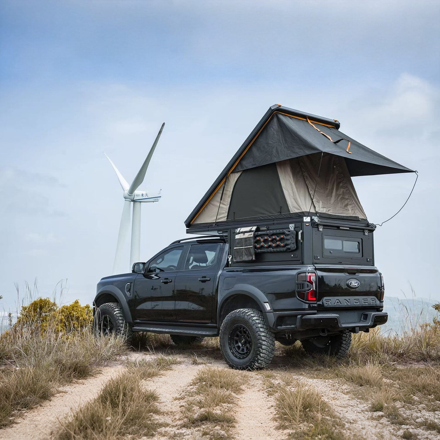 Pick-Up Canopy Clam Shell combo open on a black pick-up truck